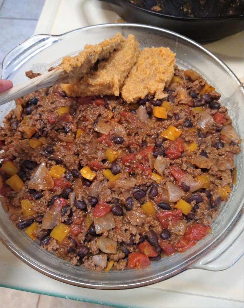 the foundation of tamale pie special - the filling being topped with cornmeal mush