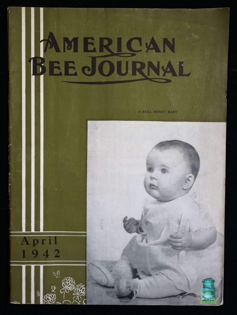 The American Bee Journal cover from April 1942 showcasing a baby sitting down wearing an old-fashioned dress and shoes